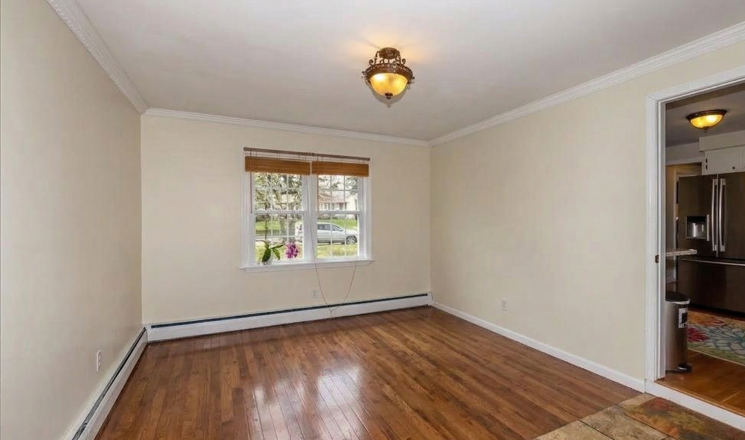 Room showing newly installed sheetrock and painted walls